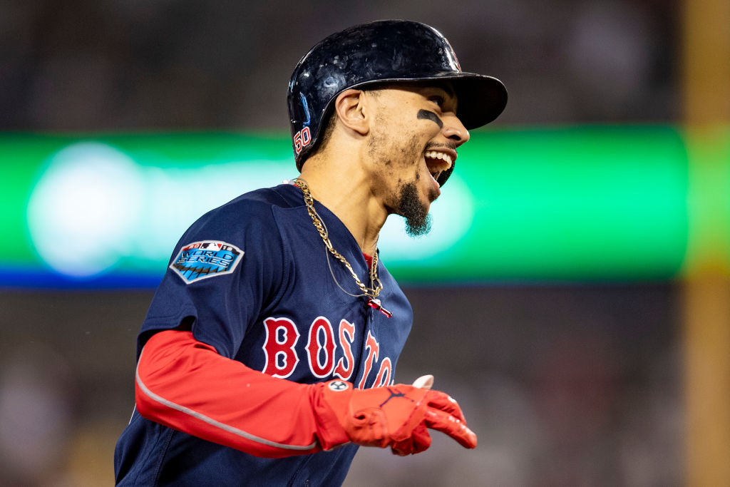 LOS ANGELES, CA - OCTOBER 28: Mookie Betts #50 of the Boston Red Sox reacts as he rounds the bases after hitting a solo home run during the sixth inning of game five of the 2018 World Series against the Los Angeles Dodgers on October 28, 2018 at Dodger Stadium in Los Angeles, California. (Photo by Billie Weiss/Boston Red Sox/Getty Images)