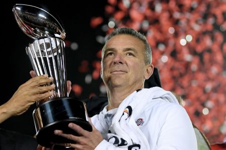 PASADENA, CA - JANUARY 01:  Ohio State Buckeyes head coach Urban Meyer with the Rose Bowl trophy celebrates winning the Rose Bowl Game presented by Northwestern Mutual at the Rose Bowl on January 1, 2019 in Pasadena, California.  (Photo by Harry How/Getty Images)