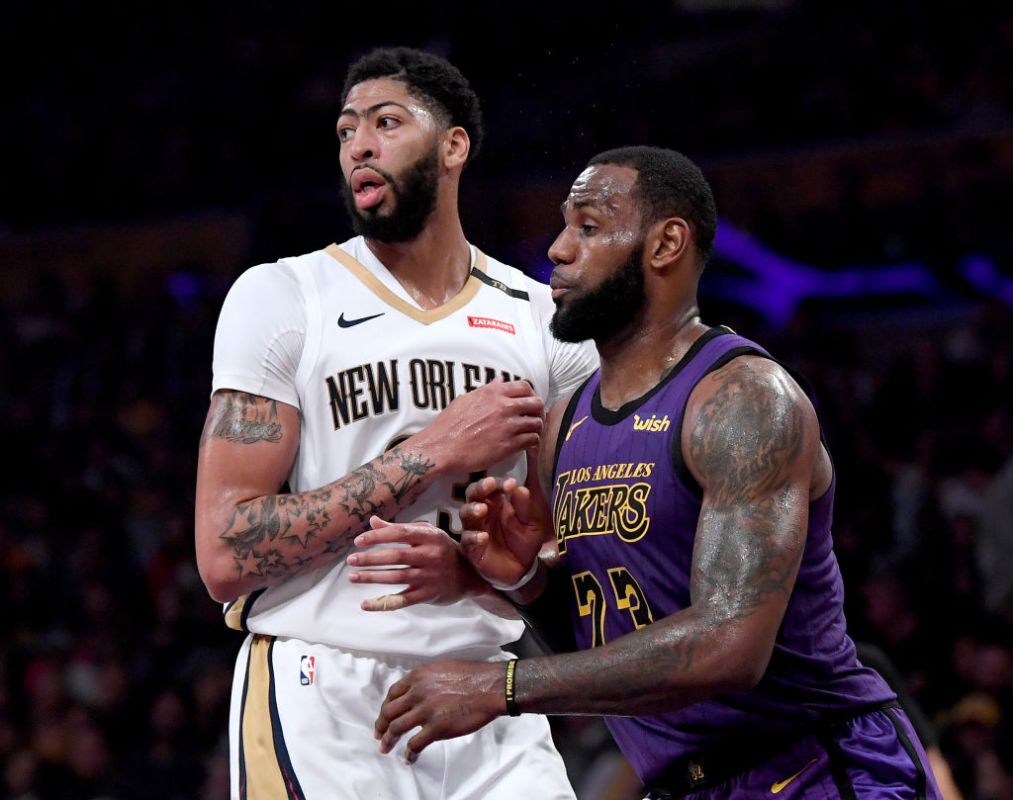 LOS ANGELES, CALIFORNIA - DECEMBER 21:  LeBron James #23 of the Los Angeles Lakers guards Anthony Davis #23 of the New Orleans Pelicans during a 112-104 Laker win at Staples Center on December 21, 2018 in Los Angeles, California. (Photo by Harry How/Getty Images)
