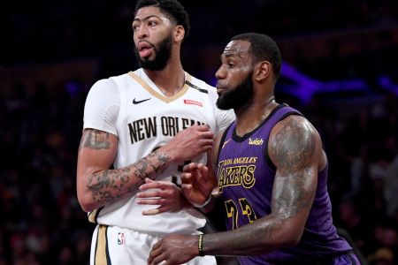 LOS ANGELES, CALIFORNIA - DECEMBER 21:  LeBron James #23 of the Los Angeles Lakers guards Anthony Davis #23 of the New Orleans Pelicans during a 112-104 Laker win at Staples Center on December 21, 2018 in Los Angeles, California. (Photo by Harry How/Getty Images)