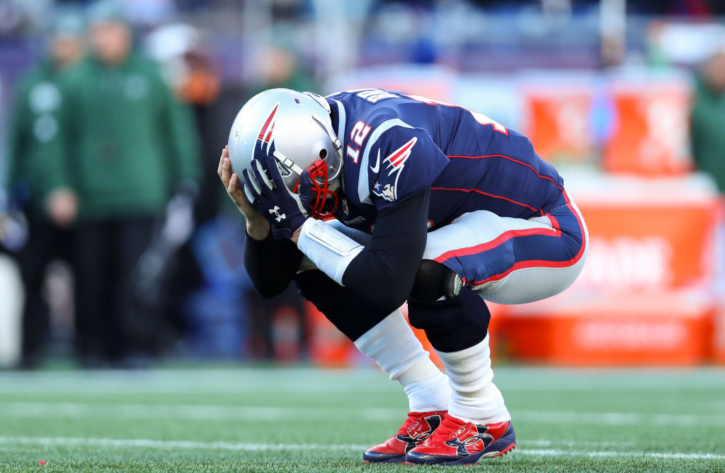 FOXBOROUGH, MASSACHUSETTS - DECEMBER 30: Tom Brady #12 of the New England Patriots reacts during the second quarter of a game against the New York Jets at Gillette Stadium on December 30, 2018 in Foxborough, Massachusetts. (Photo by Maddie Meyer/Getty Images)