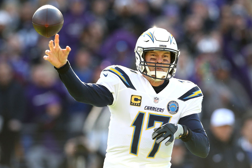 BALTIMORE, MARYLAND - JANUARY 06: Philip Rivers #17 of the Los Angeles Chargers throws a pass against the Baltimore Ravens during the first quarter in the AFC Wild Card Playoff game at M&T Bank Stadium on January 06, 2019 in Baltimore, Maryland. (Photo by Rob Carr/Getty Images)