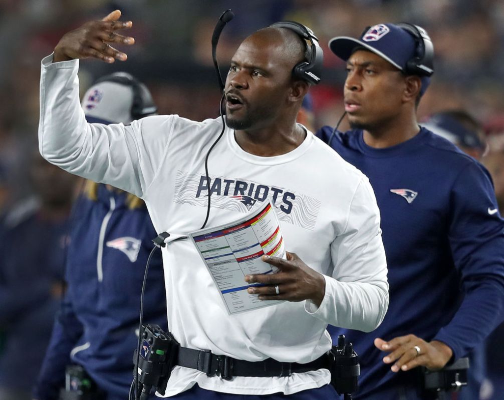 FOXBOROUGH, MA - OCTOBER 4: New England Patriots defensive signal caller Brian Flores gestures on the sidelines. The New England Patriots host the Indianapolis Colts in a regular season NFL football game at Gillette Stadium in Foxborough, MA on Oct. 4, 2018. (Photo by Jim Davis/The Boston Globe via Getty Images)