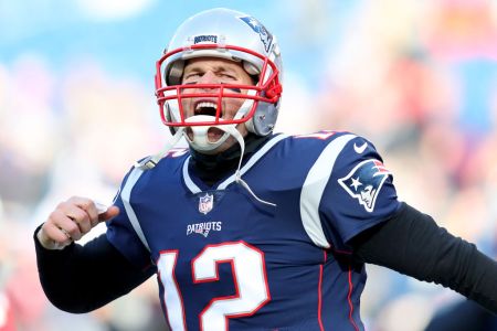 FOXBOROUGH, MASSACHUSETTS - JANUARY 13: Tom Brady #12 of the New England Patriots punches the air before the game against the Los Angeles Chargers at Gillette Stadium on January 13, 2019 in Foxborough, Massachusetts. (Photo by Maddie Meyer/Getty Images)