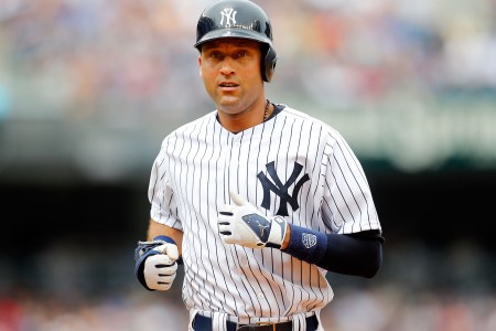 NEW YORK, NY - JULY 19:  (NEW YORK DAILIES OUT)    Derek Jeter #2 of the New York Yankees in action against the Cincinnati Reds at Yankee Stadium on July 19, 2014 in the Bronx borough of New York City. The Yankees defeated the Reds 7-1.  (Photo by Jim McIsaac/Getty Images)