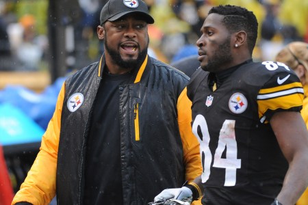 PITTSBURGH, PA - DECEMBER 29:  Head coach Mike Tomlin of the Pittsburgh Steelers talks to wide receiver Antonio Brown #84 as they walk off the field at the end of the first half during a game against the Cleveland Browns at Heinz Field on December 29, 2013 in Pittsburgh, Pennsylvania.  The Steelers defeated the Browns 20-7.  (Photo by George Gojkovich/Getty Images)
