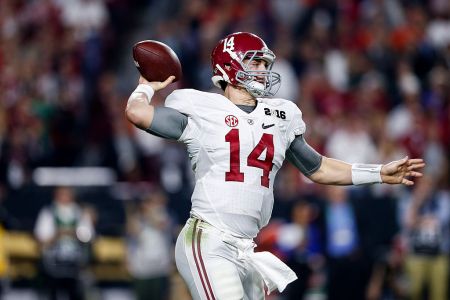 GLENDALE, AZ - JANUARY 11: Alabama Crimson Tide Quarterback Jake Coker #14 on a passing play during the College Football National Championship Game against the Clemson Tigers at University of Phoenix Stadium on January 11, 2016 in Glendale, Arizona. The Alabama Crimson Tide defeated the Clemson Tigers 45-41. (Photo by Don Juan Moore/Getty Images)