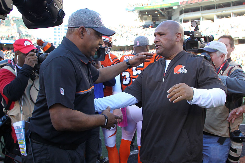  Head Coach Marvin Lewis of the Cincinnati Bengals and Head Coach Hue Jackson of the Cleveland Browns shake hands after the completion of the game at Paul Brown Stadium on October 23, 2016 in Cincinnati, Ohio. (Photo by John Grieshop/Getty Images)