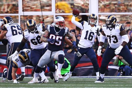 FOXBORO, MA - DECEMBER 04:  Jared Goff #16 of the Los Angeles Rams throws a pass during the first half against the New England Patriots at Gillette Stadium on December 4, 2016 in Foxboro, Massachusetts.  (Photo by Adam Glanzman/Getty Images)