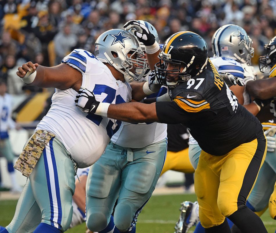PITTSBURGH, PA - NOVEMBER 13: Offensive lineman Joe Looney #73 of the Dallas Cowboys blocks against defensive lineman Cameron Heyward #97 of the Pittsburgh Steelers during a game at Heinz Field on November 13, 2016 in Pittsburgh, Pennsylvania. The Cowboys defeated the Steelers 35-30.  (Photo by George Gojkovich/Getty Images)