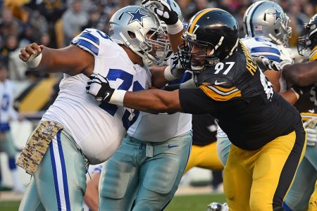 PITTSBURGH, PA - NOVEMBER 13: Offensive lineman Joe Looney #73 of the Dallas Cowboys blocks against defensive lineman Cameron Heyward #97 of the Pittsburgh Steelers during a game at Heinz Field on November 13, 2016 in Pittsburgh, Pennsylvania. The Cowboys defeated the Steelers 35-30.  (Photo by George Gojkovich/Getty Images)