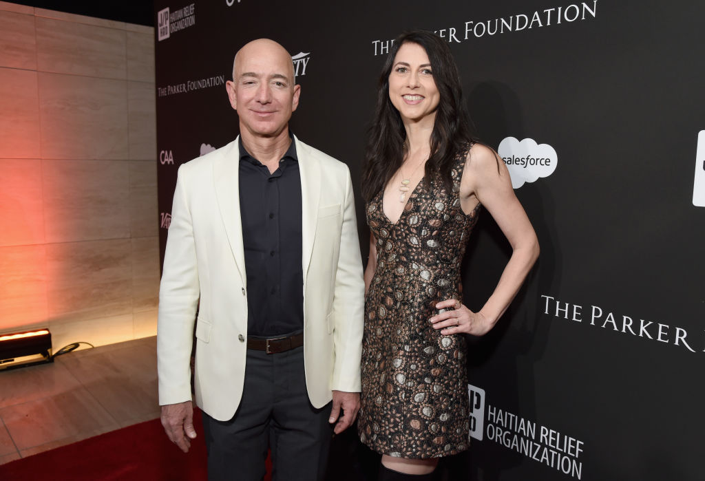 LOS ANGELES, CA - JANUARY 06:  Chief Executive Officer of Amazon Jeff Bezos (L) and MacKenzie Bezos attend the 7th Annual Sean Penn & Friends HAITI RISING Gala benefiting J/P Haitian Relief Organization on January 6, 2018 in Hollywood, California.  (Photo by Michael Kovac/Getty Images for for J/P HRO Gala)