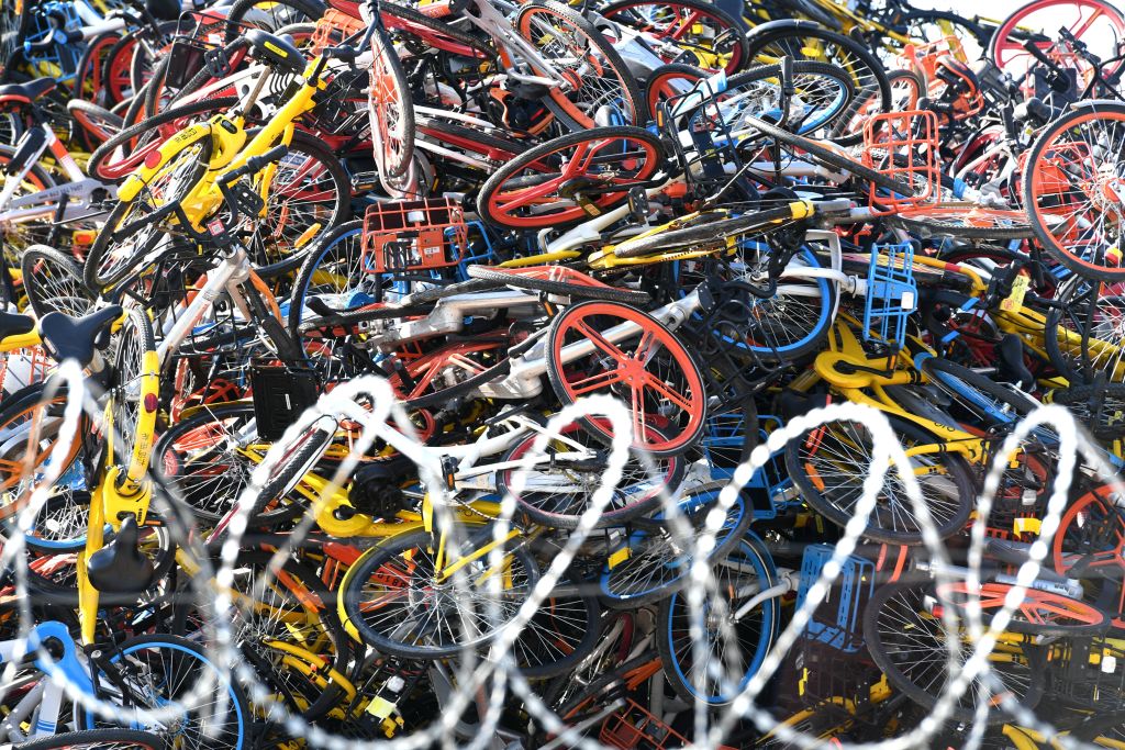 Over a hundred thousand shared bikes are piled up at an open area in Tong'an District on January 13, 2018 in Xiamen, Fujian Province of China. (Photo by Wang Dongming/China News Service/VCG via Getty Images)