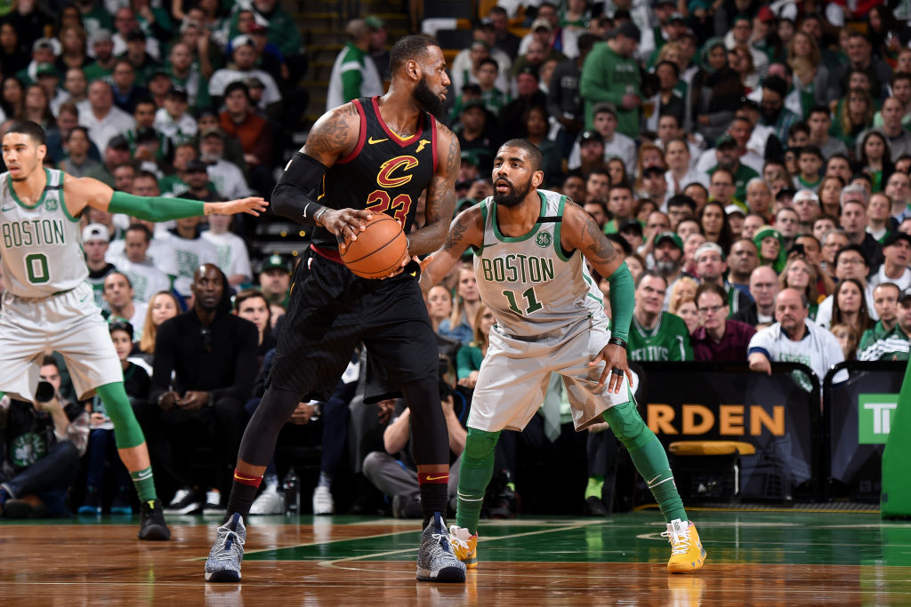BOSTON, MA - FEBRUARY 11: LeBron James #23 of the Cleveland Cavaliers handles the ball against Kyrie Irving #11 of the Boston Celtics during the game between the two teams on February 11, 2018 at the TD Garden in Boston, Massachusetts. (Photo by Brian Babineau/NBAE via Getty Images)