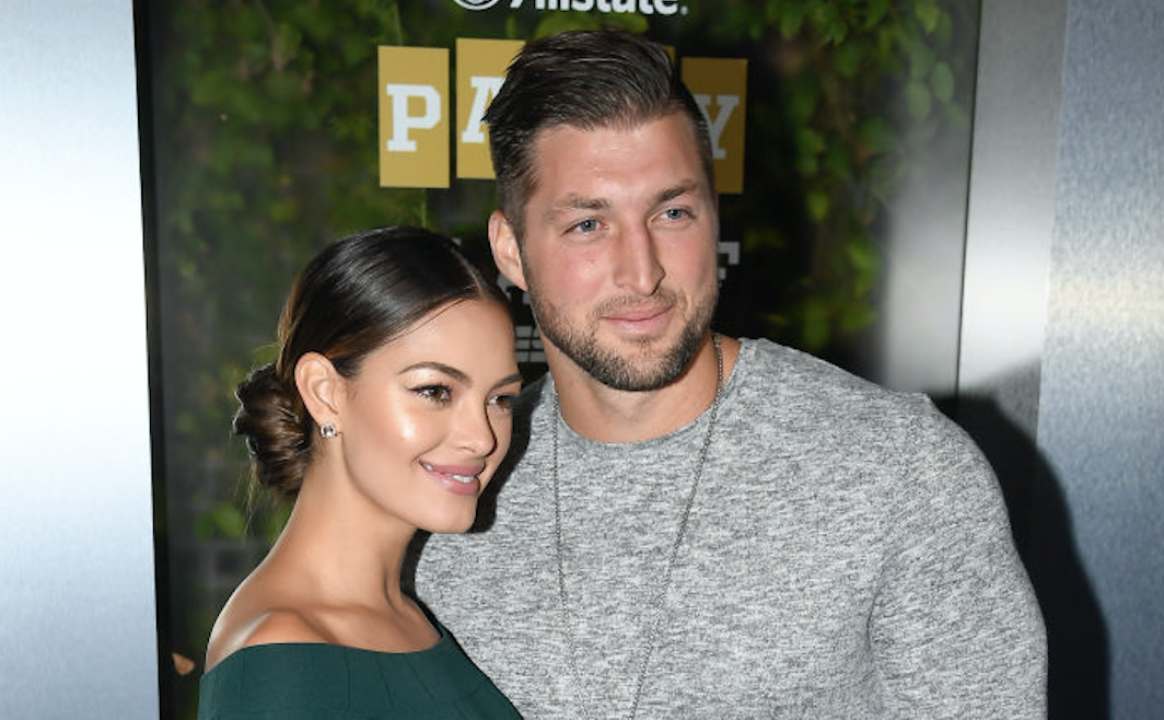 SAN JOSE, CA - JANUARY 05: (L-R) Miss Universe 2017 Demi-Leigh Nel-Peters and Tim Tebow of ESPN attend the Party At The Playoff at The GlassHouse on January 5, 2019 in San Jose, California. (Photo by Steve Jennings/Getty Images for ESPN)