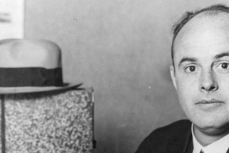 George L. Cassiday seated at desk. (Library of Congress Prints and Photographs Division Washington, D.C.)