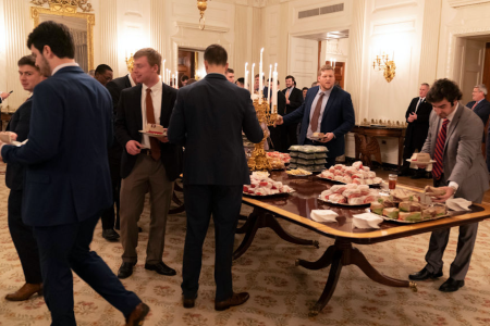 WASHINGTON, DC - JANUARY 14: (AFP OUT) Members of the Clemson Tigers football team prepare to dine on fast food served by President Trump to celebrate their Championship at the White House on January 14, 2019 in Washington, DC. (Photo by Chris Kleponis-Pool/Getty Images)