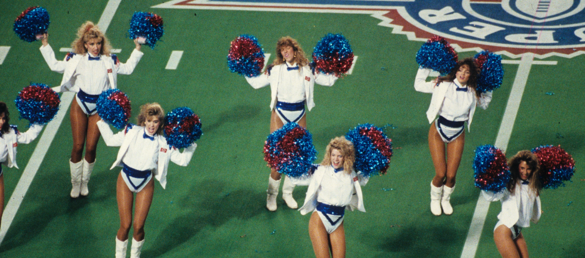 MINNEAPOLIS, MN - JANUARY 26: The Buffalo Bills cheerleaders, the 'Jills' cheer before their team took on the Washington Redskins in Super Bowl XXVI at the Metrodome on January 26, 1992 in Minneapolis, Minnesota. The Redskins defeated the Bills 37-24. (Photo by Gin Ellis/Getty Images)