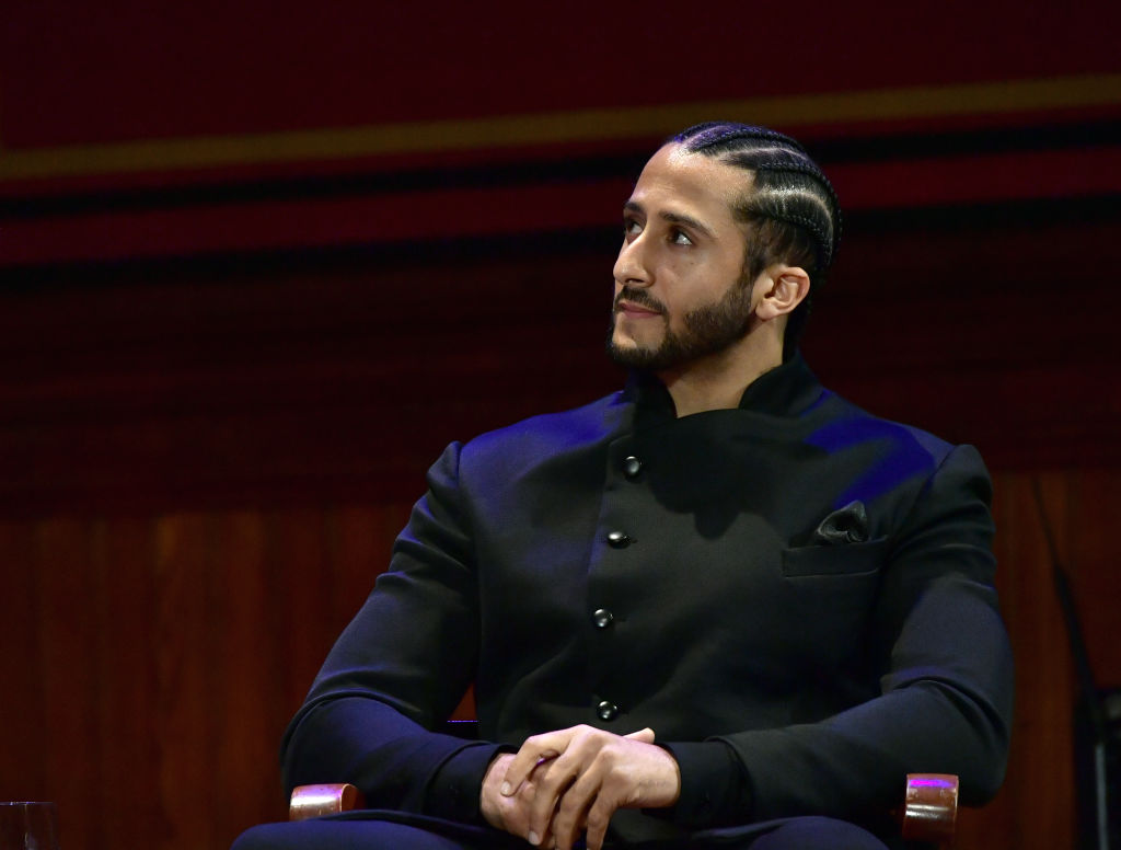CAMBRIDGE, MA - OCTOBER 11:  Colin Kaepernick on stage at the W.E.B. Du Bois Medal Award Ceremony at Harvard University on October 11, 2018 in Cambridge, Massachusetts.   2018 Honorees included Kehinde Wiley, Florence Ladd, Kenneth Chenault,  Shirley Ann Jackson, Pamela Joyner, Bryan Stevenson, Dave Chappelle and Colin Kaepernick.  (Photo by Paul Marotta/Getty Images)