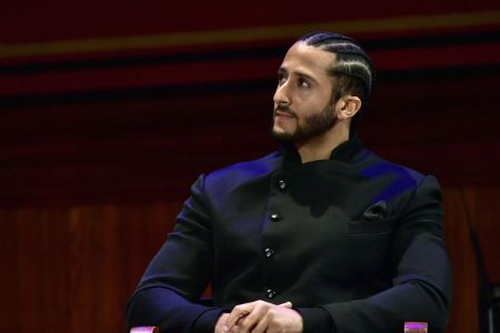 CAMBRIDGE, MA - OCTOBER 11:  Colin Kaepernick on stage at the W.E.B. Du Bois Medal Award Ceremony at Harvard University on October 11, 2018 in Cambridge, Massachusetts.   2018 Honorees included Kehinde Wiley, Florence Ladd, Kenneth Chenault,  Shirley Ann Jackson, Pamela Joyner, Bryan Stevenson, Dave Chappelle and Colin Kaepernick.  (Photo by Paul Marotta/Getty Images)