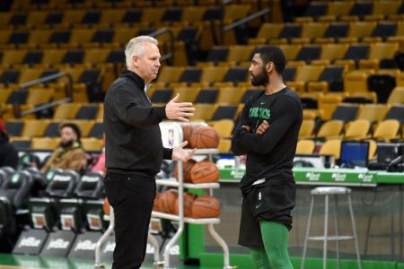 BOSTON, MA - NOVEMBER 17: General Manager Danny Ainge and Kyrie Irving #11 of the Boston Celtics talk before the game against the Utah Jazz on November 17, 2018 at the TD Garden in Boston, Massachusetts.(Photo by Steve Babineau/NBAE via Getty Images)