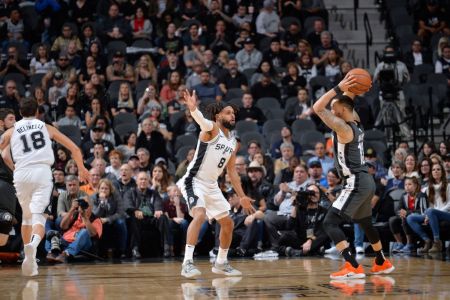 SAN ANTONIO, TX - JANUARY 31:  Shabazz Napier #13 of the Brooklyn Nets handles the ball against Patty Mills #8 of the San Antonio Spurs on January 31, 2019 at the AT&T Center in San Antonio, Texas.  (Photos by Mark Sobhani/NBAE via Getty Images)