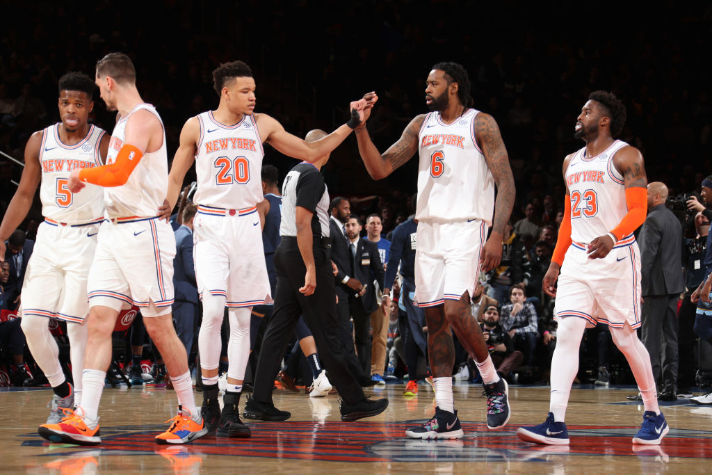 NEW YORK, NY - FEBRUARY 3: Kevin Knox #20 of the New York Knicks high-fives DeAndre Jordan #6 of the New York Knicks against the Memphis Grizzlies on February 3, 2019 at Madison Square Garden in New York City, New York. (Photo by Nathaniel S. Butler/NBAE via Getty Images)