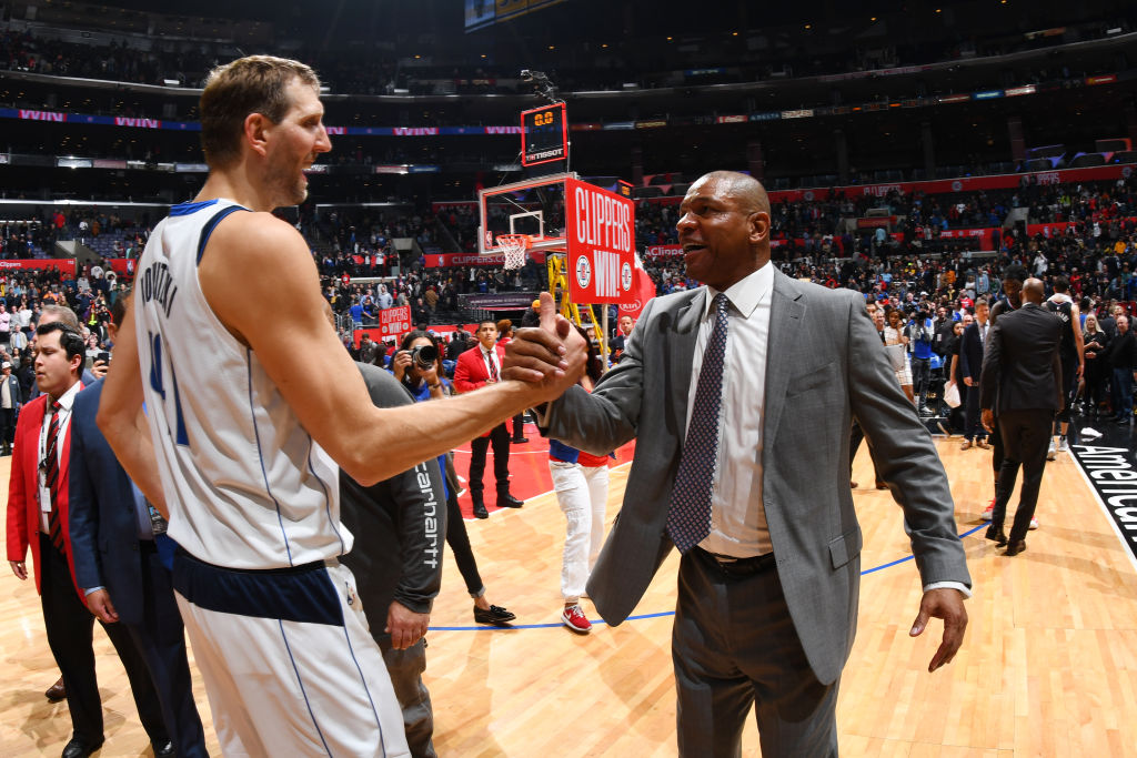 LOS ANGELES, CA - FEBRUARY 25: Dirk Nowitzki #41 of the Dallas Mavericks and Head Coach Doc Rivers of the LA Clippers shake hands after a game on February 25, 2019 at STAPLES Center in Los Angeles, California. (Photo by Adam Pantozzi/NBAE via Getty Images)
