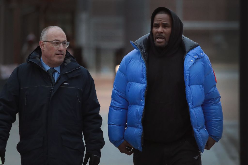 CHICAGO, ILLINOIS - FEBRUARY 25: R&B singer R. Kelly (R) and his attorney Steve Greenberg leave Cook County jail after Kelly posted $100 thousand bond on February 25, 2019 in Chicago, Illinois.  Kelly was being held after turning himself in to face ten counts of aggravated sexual abuse.  (Photo by Scott Olson/Getty Images)