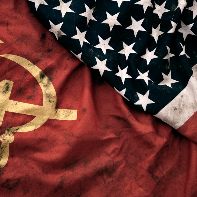 Soviet Union and United States of America flags. (Getty)