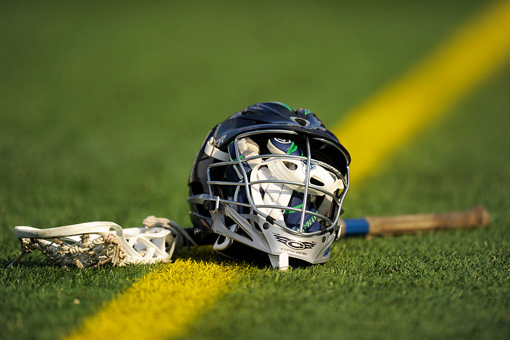 ANNAPOLIS, MD - JUNE 06:  Chesapeake Bayhawks player's stick, gloves and helmet on the field before a MLL lacrosse game against the Denver Outlaws at Navy-Marine Corps Memorial Stadium on June 6, 2015 in Annapolis, Maryland.  (Photo by Mitchell Layton/Getty Images)