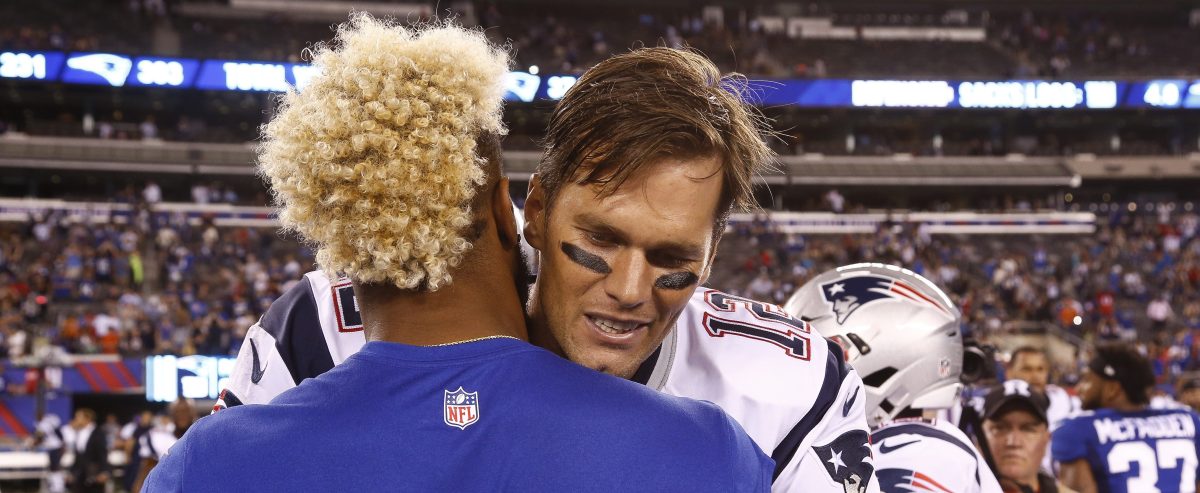 Tom Brady #12 of the New England Patriots talks with Odell Beckham #13 of the New York Giants during a preseason game at MetLife Stadium on September 1, 2016 in East Rutherford, New Jersey. (Photo by Jeff Zelevansky/Getty Images)