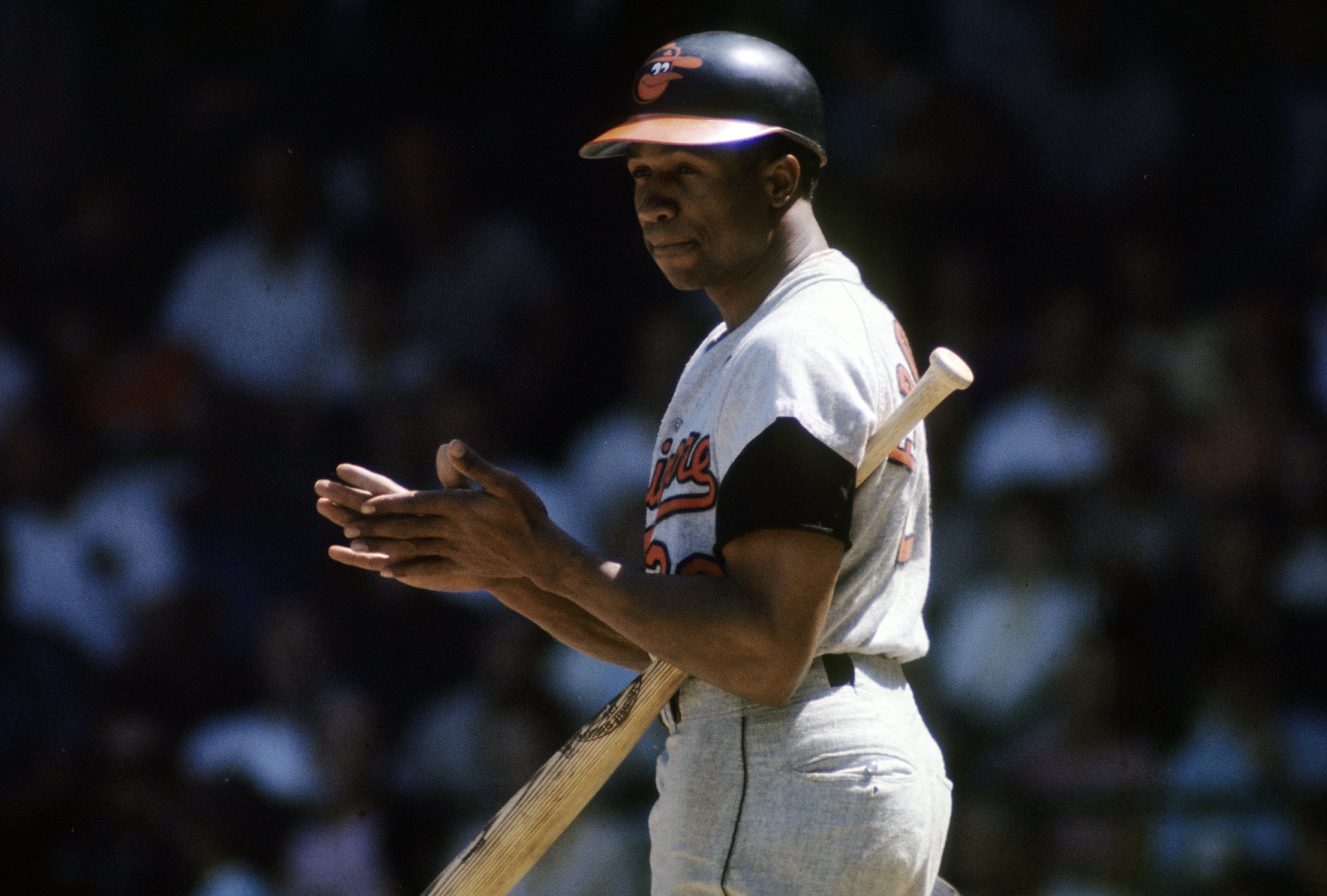 CIRCA 1960s: Outfielder Frank Robinson #20 of the Baltimore Orioles at the plate getting signals from the 3rd base coach during  a circa late 1960s Major League Baseball game. Robinson played for the Orioles from 1966-71. (Photo by Focus on Sport/Getty Images)