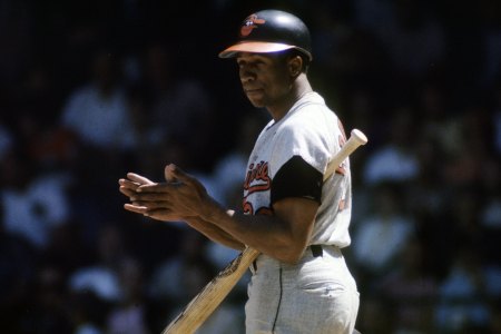 CIRCA 1960s: Outfielder Frank Robinson #20 of the Baltimore Orioles at the plate getting signals from the 3rd base coach during  a circa late 1960s Major League Baseball game. Robinson played for the Orioles from 1966-71. (Photo by Focus on Sport/Getty Images)