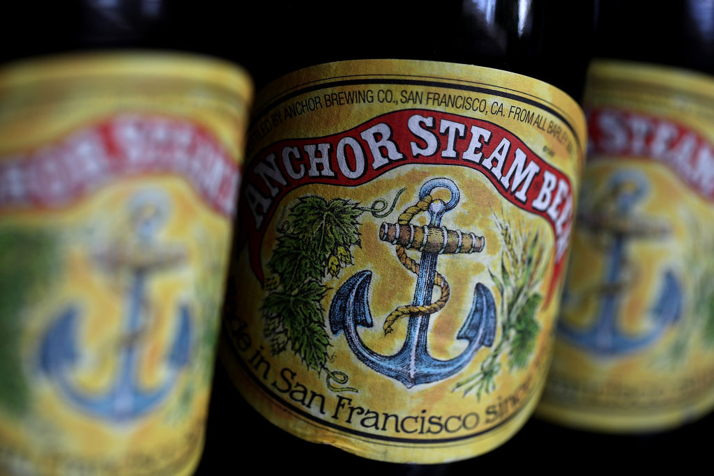 SAN ANSELMO, CA - AUGUST 03:  Bottles of Anchor Steam beer are displayed on August 3, 2017 in San Anselmo, California. San Francisco based Anchor Brewing announced plans to sell to JapanÕs Sapporo Holdings Ltd for an undisclosed amount. Anchor Steam has brewed in San Francisco for 121 years.  (Photo by Justin Sullivan/Getty Images)
