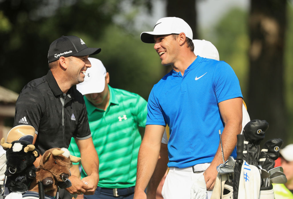 CHARLOTTE, NC - AUGUST 10: Sergio Garcia of Spain and Brooks Koepka of the United States share a laugh on the 13th tee during the first round of the 2017 PGA Championship at Quail Hollow Club on August 10, 2017 in Charlotte, North Carolina.  (Photo by Mike Ehrmann/Getty Images)