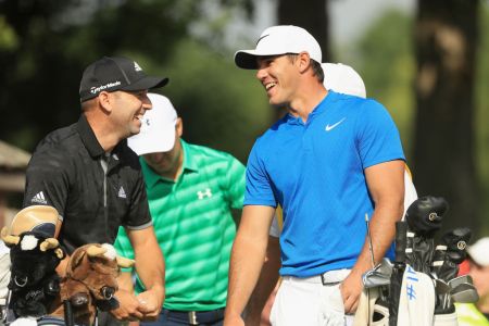 CHARLOTTE, NC - AUGUST 10: Sergio Garcia of Spain and Brooks Koepka of the United States share a laugh on the 13th tee during the first round of the 2017 PGA Championship at Quail Hollow Club on August 10, 2017 in Charlotte, North Carolina.  (Photo by Mike Ehrmann/Getty Images)