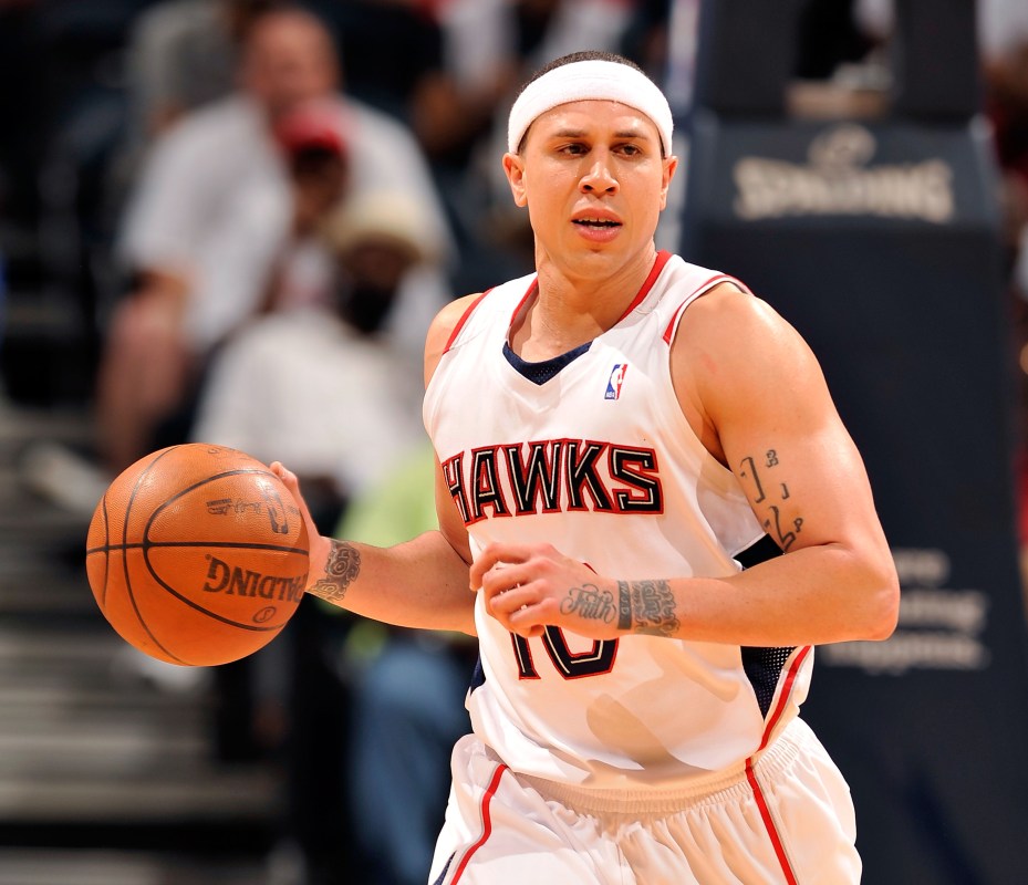ATLANTA - APRIL 17:  Mike Bibby #10 of the Atlanta Hawks moves the ball against the Milwaukee Bucks during Game One of the Eastern Conference Quarterfinals of the 2010 NBA Playoffs at Philips Arena on April 17, 2010 in Atlanta, Georgia. (Photo by Grant Halverson/Getty Images)