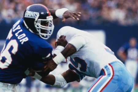 EAST RUTHERFORD, NJ: Lawrence Taylor #56 of the New York Giants pass rushes against the Houston Oilers during a circa 1980s game at Giants Stadium in East Rutherford, New Jersey. Taylor played for the Giants from 1981-93. (Photo by Focus Sport/Getty Images)