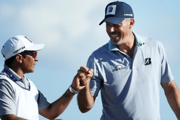 PLAYA DEL CARMEN, MEXICO - NOVEMBER 09: Matt Kuchar of the United States celebrates his birdie with his caddie on the 15th green during the second round of the Mayakoba Golf Classic at El Camaleon Mayakoba Golf Course on November 09, 2018 in Playa del Carmen, Mexico. (Photo by Rob Carr/Getty Images)