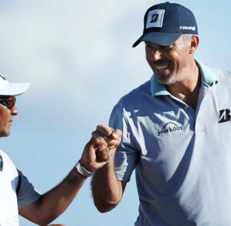 PLAYA DEL CARMEN, MEXICO - NOVEMBER 09: Matt Kuchar of the United States celebrates his birdie with his caddie on the 15th green during the second round of the Mayakoba Golf Classic at El Camaleon Mayakoba Golf Course on November 09, 2018 in Playa del Carmen, Mexico. (Photo by Rob Carr/Getty Images)