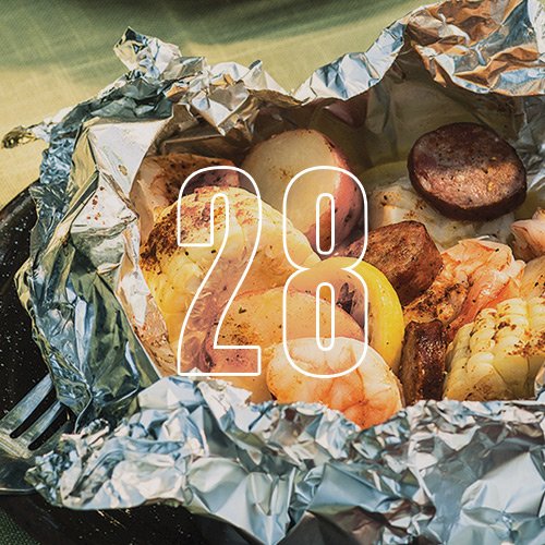 Cajun seafood wrapped in aluminum foil, with an overlay of the number "28"