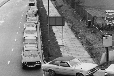 5th December 1973:  Cars queuing for fuel during the oil crisis of 1973. (Evening Standard/Getty Images)