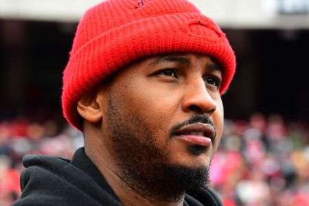 ATHENS, GA - NOVEMBER 24: NBA free agent Carmelo Anthony watches play from the sidelines between the Georgia Bulldogs and the Georgia Tech Yellow Jackets on November 24, 2018 at Sanford Stadium in Athens, Georgia. (Photo by Scott Cunningham/Getty Images)