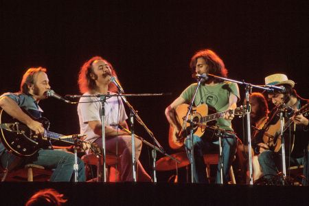 Crosby Stills Nash and Young perform in 1974 in London. (Getty Images)