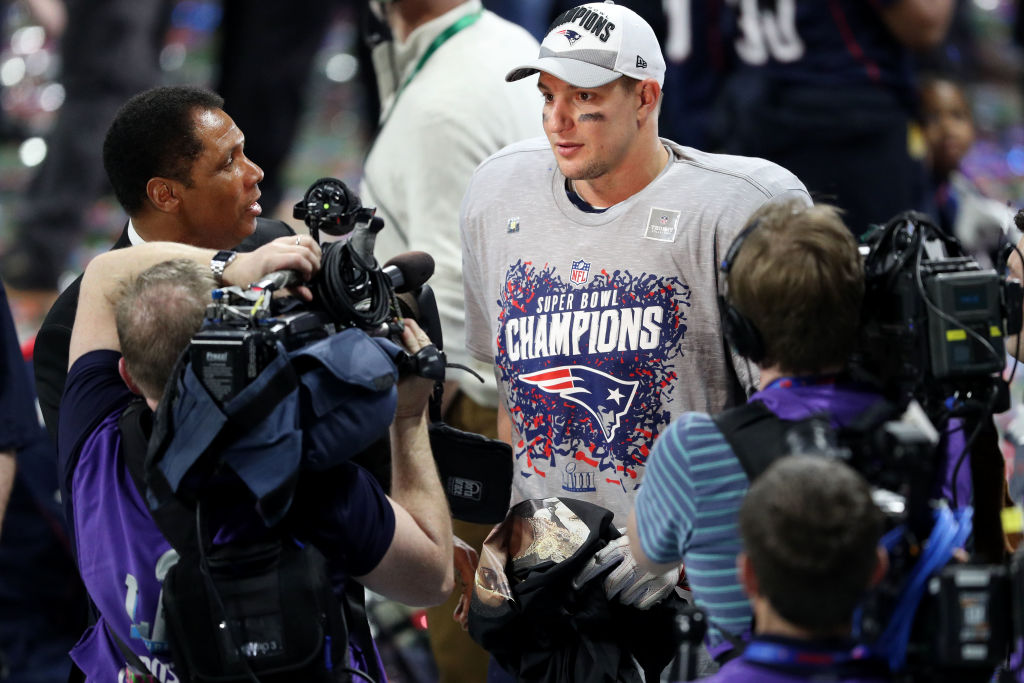 ATLANTA, GEORGIA - FEBRUARY 03:  Rob Gronkowski #87 of the New England Patriots is interviewed after his teams 13-3 win over the Los Angeles Rams during Super Bowl LIII at Mercedes-Benz Stadium on February 03, 2019 in Atlanta, Georgia. (Photo by Patrick Smith/Getty Images)