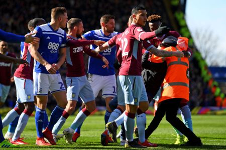 A fan is wrestled to the ground by a steward after punching Jack Grealish of Aston Villa during the Sky Bet Championship match between Birmingham City and Aston Villa at St Andrew's Trillion Trophy Stadium on March 10, 2019 in Birmingham, England. (Photo by Alex Davidson/Getty Images)