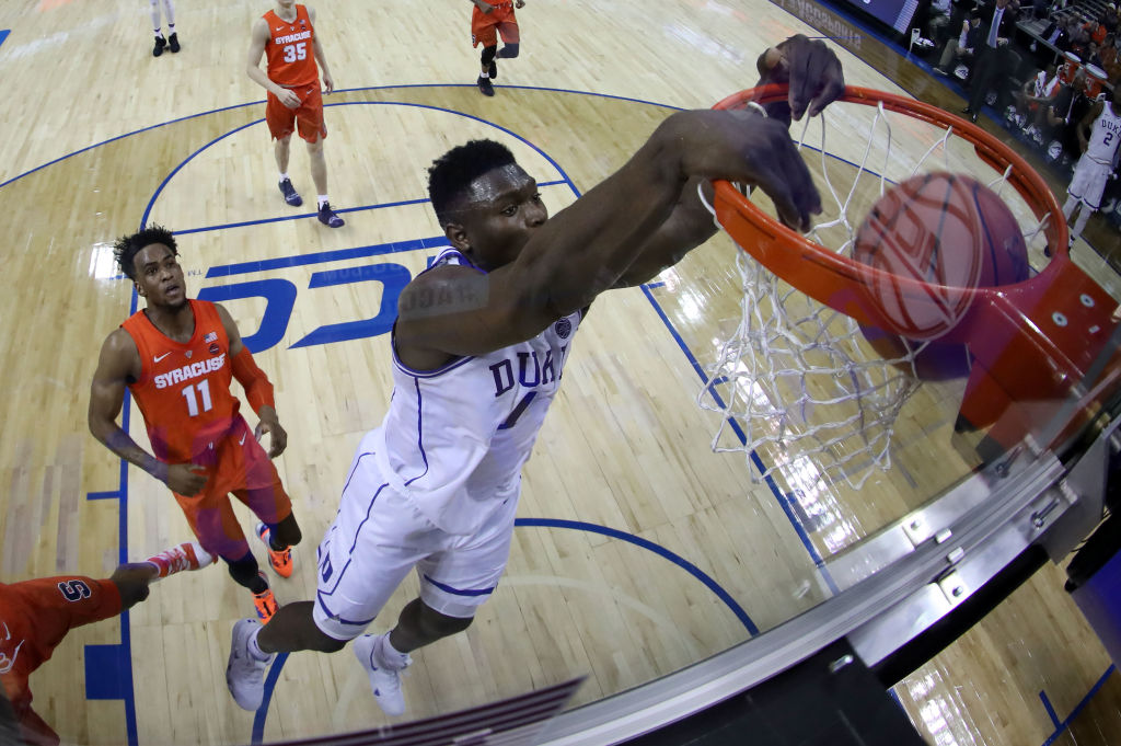 CHARLOTTE, NORTH CAROLINA - MARCH 14: Zion Williamson #1 of the Duke Blue Devils dunks the ball against the Syracuse Orange during their game in the quarterfinal round of the 2019 Men's ACC Basketball Tournament at Spectrum Center on March 14, 2019 in Charlotte, North Carolina. (Photo by Streeter Lecka/Getty Images)