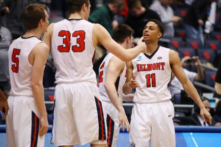 Kevin McClain #11 of the Belmont Bruins celebrates with teammates during the second half against the Temple Owls in the First Four of the 2019 NCAA Men's Basketball Tournament at UD Arena on March 19, 2019 in Dayton, Ohio. (Photo by Gregory Shamus/Getty Images)