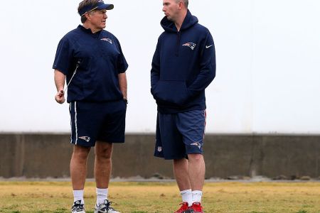 TEMPE, AZ - JANUARY 30:  Head coach Bill Belichick of the New England Patriots talks with Jack Easterby during the New England Patriots Super Bowl XLIX Practice on January 30, 2015 at the Arizona Cardinals Practice Facility in Tempe, Arizona.  (Photo by Elsa/Getty Images)